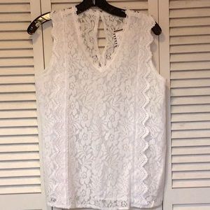 Woman’s size medium white lace V-neck blouse